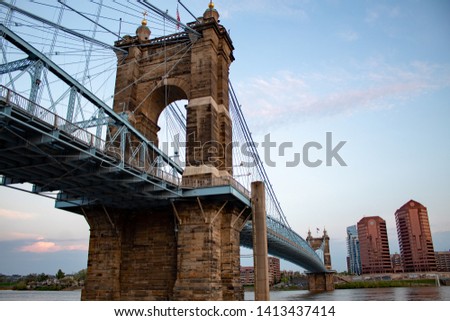 View of the iconic John A. Roebling Bridge that connects Covington Kentucky to Cincinnati , Ohio.