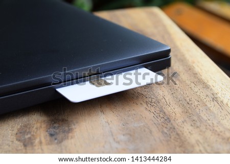 Blank smartcard on keyboard of laptop computer
