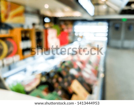 Blur background with bokeh of Supermarket store 