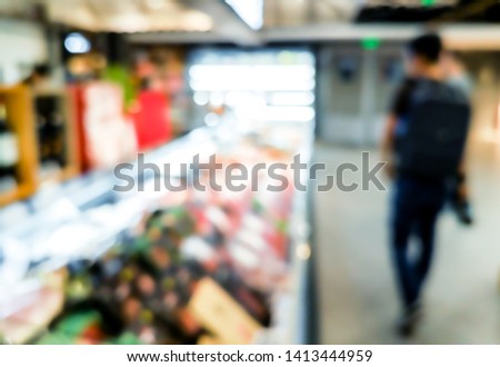 Blur background with bokeh of Supermarket store 