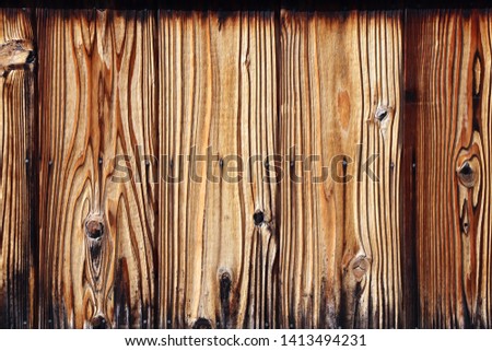 Texture of old wooden boards of brown color