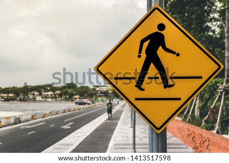 Pedestrian signs, Blurred background with people running