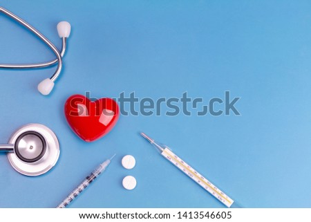 Health heart with Red heart and medical equipment on blue background and copy space used for add messages. Cardiologist health.