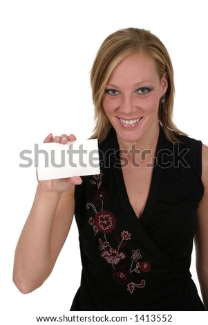 Attractive smiling business woman holding blank card with room for text.