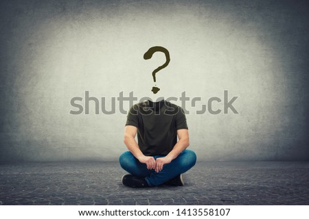 Surreal headless guy, invisible face seated on the floor with a question mark instead of head, like a mask, for hiding identity. Interrogation sign symbolizing anonymity. Uncertainty concept. Royalty-Free Stock Photo #1413558107