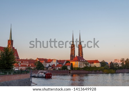 sunset over the river Odra and Wroclaw panorama in soring