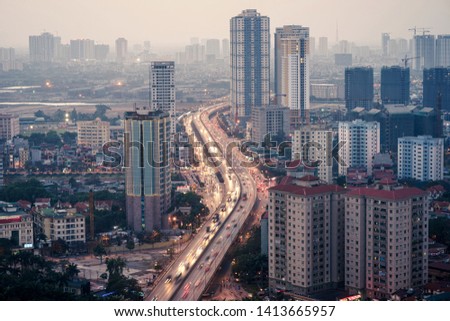 Aerial skyline view of Hanoi city, Vietnam. Hanoi cityscape by sunset period at Belt Road No. 3, Hoang Mai district
