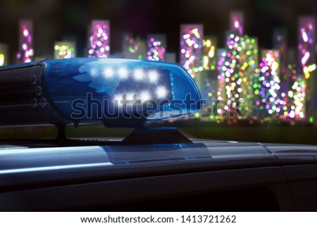 police car at night on the road