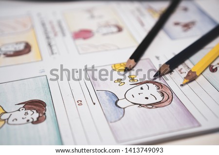 Creator drawing Story board movie video layout for pre-production, development cartoon illustration animation for process media films in form displayed script film production. Media product concept.