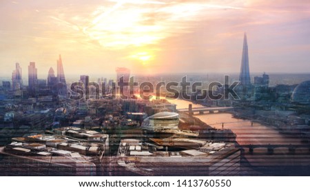 City of London at sunset. Image include the river Thames, City of London financial buildings and london's bridges. UK