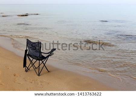 lounge chair by the mediterranean sea