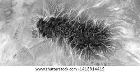electric bacteria, allegory, abstract naturalism, Black and white photo, abstract photography of landscapes of the deserts of Africa from the air, aerial view, contemporary photographic art, 