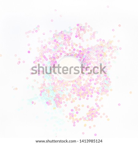 Сosmetic cream lotion jar on white pearl pastel confetti sparkles background with copy space. Creative conceptual top view flat lay backdrop for your beauty blog text design