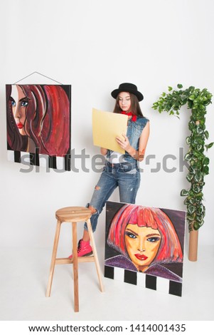 Young girl teenage woman painting paint, creative art concept hobbies 