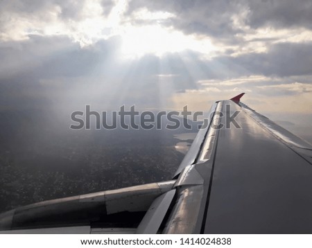 Under the wing of the plane. Panoramic views of the sky and the earth from the window of the plane. Europe.2019