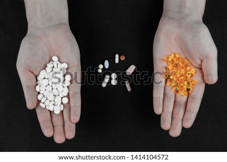 Various pills, vitamin pills at the crowds, drugs enhancing supplements pharmacy, fish oil, vitamin complex
