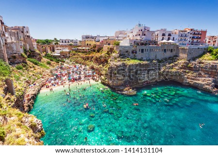 Polignano a Mare, Italy. Summertime beach of Cala Paura in Puglia, Adriatic Sea. Royalty-Free Stock Photo #1414131104