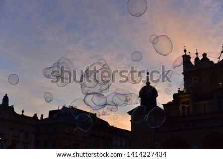 Europe, old church under sunsetand bubbles
