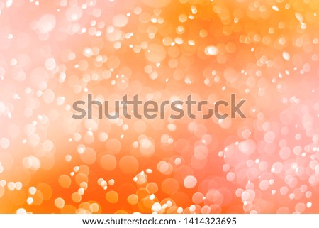 Abstract orange bokeh circles , bokeh abstract Christmas and new year theme background, orange defocused light,