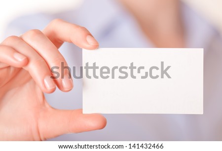 women handing a blank business card