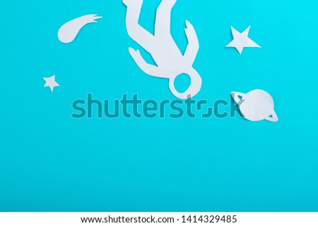 cartoon styled astronaut on the blue background