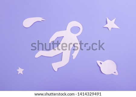 cartoon styled astronaut on the blue background