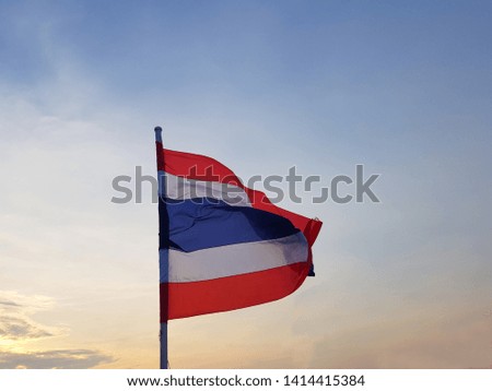 Flag of Thailand(National flag). flutters in the wind.
Blown by the wind.flick.There are three colors Including White, blue and red. blue Sky backdrop