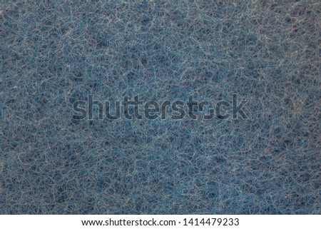 Blue abstract background consisting of a million small intertwining hairs. Nanofibres and microstructure of the enlarged surface of the material. The pattern created in a natural way. Royalty-Free Stock Photo #1414479233