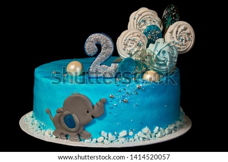 Cake the Elephant calf with balloons to the child of two years