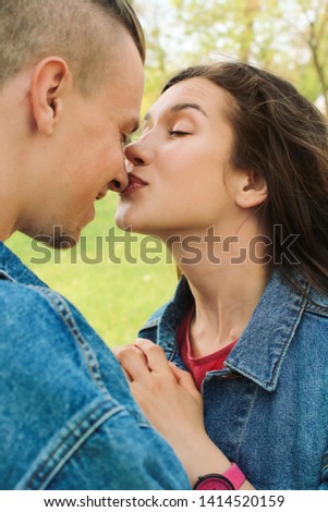 Adorable young loving couple outdoors