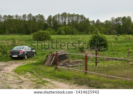 parking car on beauty rural landscape background