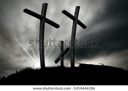 Three silhouettes of Christian crosses above a hill on a cloudy sky. Religious symbol of good friday
