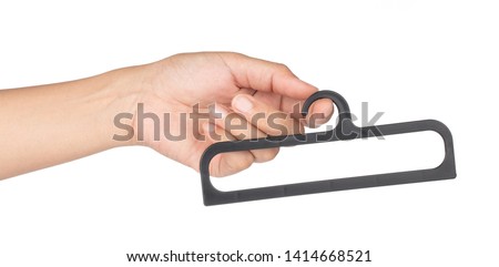 hand holding Clothes Hanger small  isolated on white background