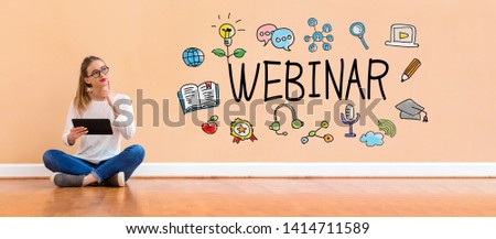 Webinar with young woman holding a tablet computer
