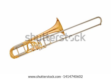 Gold classic brass musical instrument trombone isolated on white background. Music instruments series Royalty-Free Stock Photo #1414740602