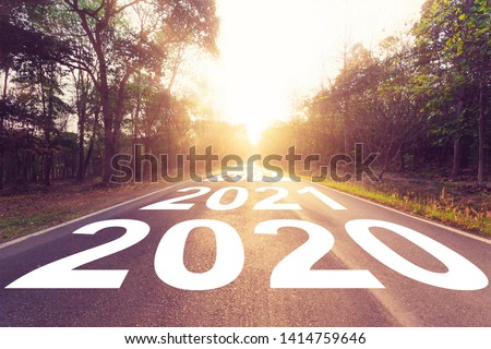 Empty asphalt road and New year 2020 concept. Driving on an empty road to Goals 2020. Royalty-Free Stock Photo #1414759646