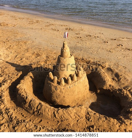 Sand castle on the ocean beach