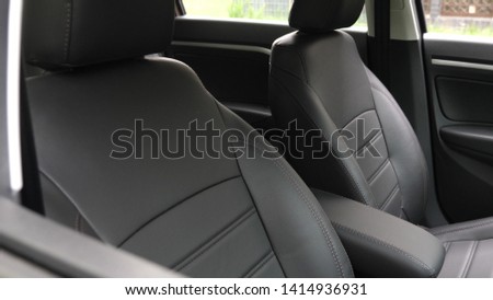 luxury leather seats in the car. Black leather seat covers in car. beautiful leather car interior design. stylish leather seats in the car. Royalty-Free Stock Photo #1414936931