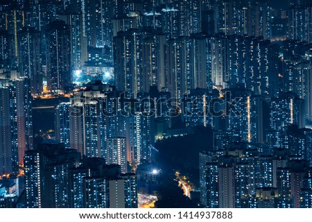 City Aerial view skyscrapers office lighting and Blinking light in apartments - Nighttime skyline City of a big modern building Royalty-Free Stock Photo #1414937888