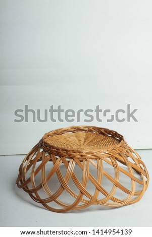wicker dish on a white background