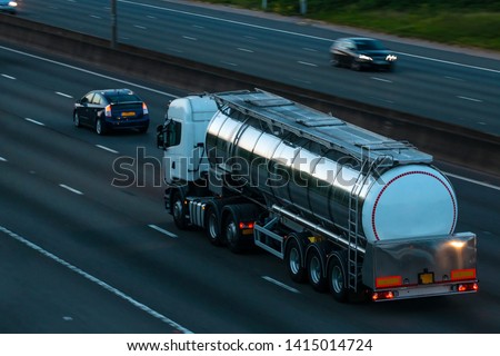 Cistern lorry in motion on the motorway Royalty-Free Stock Photo #1415014724