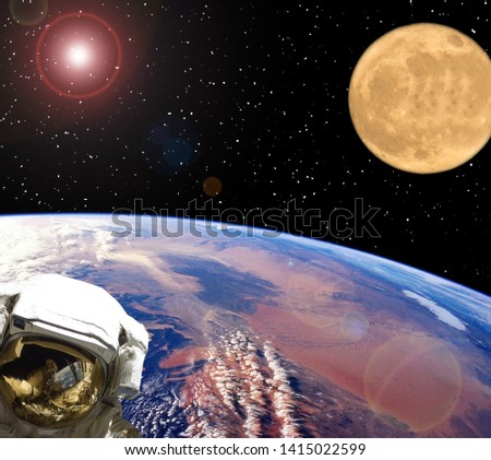 Astronaut and moon. Earth on the backdrop. The elements of this image furnished by NASA.

