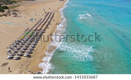 Aerial drone photo of paradise sandy deep turquoise beach of Falasarna in North West Crete island, Greece Royalty-Free Stock Photo #1415033687