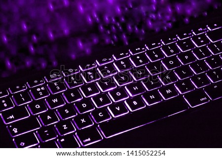 Purple colour laptop, notebook  PC keyboard on black background