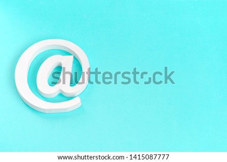 Email symbol on blue background. Concept for internet, contact us and e-mail address