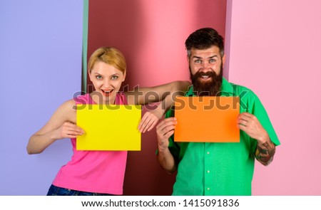 Couple holding advertising board. Advertising. Sale. Online shopping. Advertising banner. Seasons sale. Discount. Marketing. Add. Copy space for text.