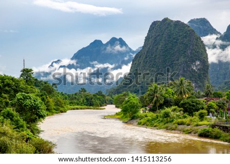 Surreal landscape mountain view with Song river in Vang Viang, Laos