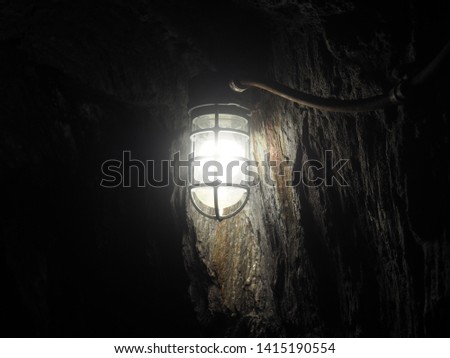 A picture of an industrial mining lamp. 