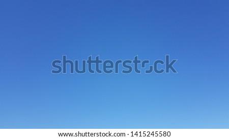 Blue background; gradient and light in Sun-light  