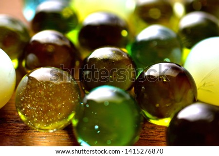 Beautiful marbles on wood board
